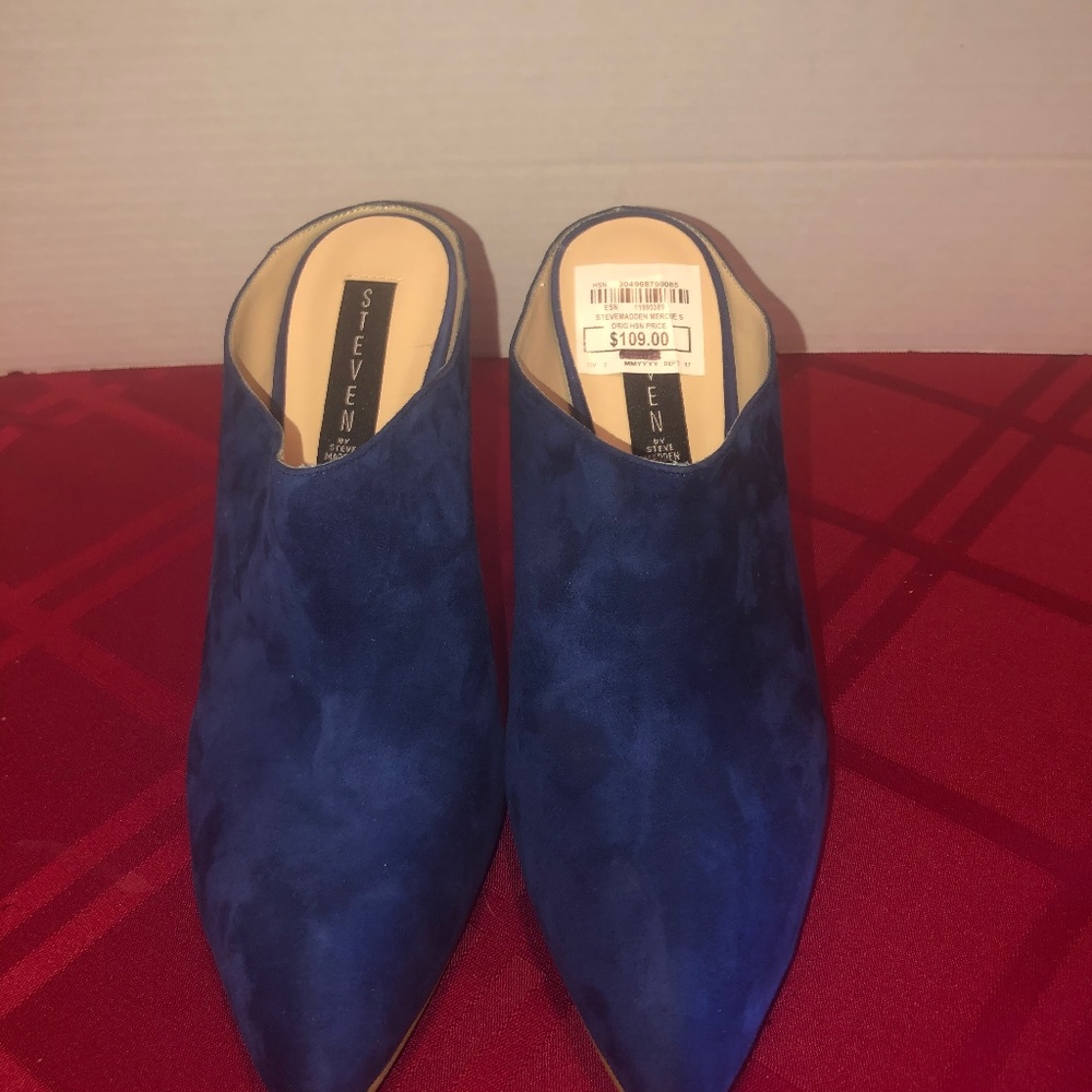 Steve Madden blue suede wedge mules.